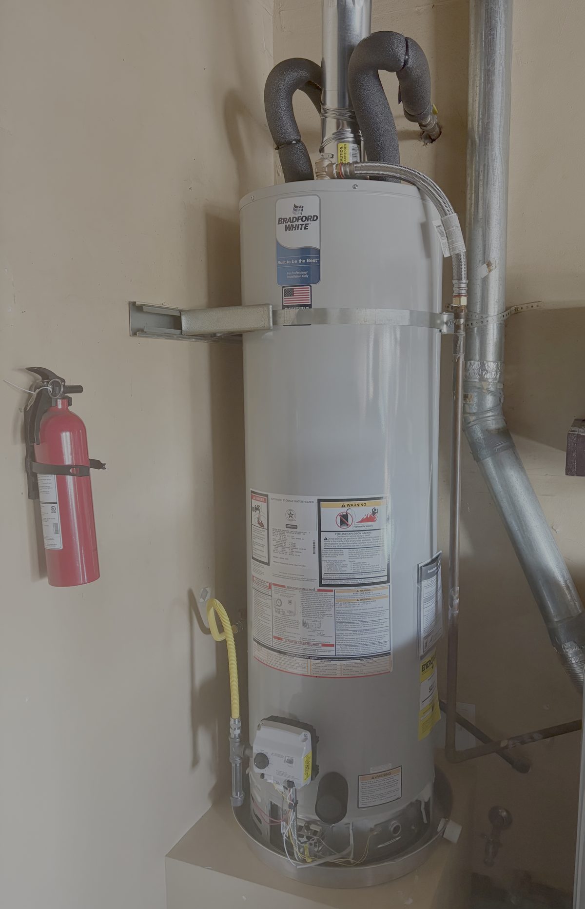 New Rheem water heater installed to code